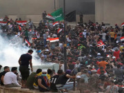 عراق میں ہنگاموں میں شدت بغداد میں کرفیو