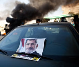 مصرمعزول صدرمحمد مرسی عدالت میں پیشاخوان کااحتجاج