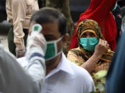 غربت اور کورونا کے درمیان