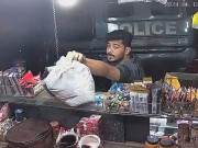 کراچی میں پولیس موبائل میں سادہ لباس افراد کی پان کے کھوکھے میں لوٹ مار