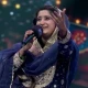 حرا قیصر اپنے بچے کو گود میں لیکر اسٹیج پر انعام وصول کرنے پہنچی تھیں