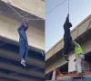 کراچی؛ نشے کا عادی شخص پل کی حفاظتی دیوار پھلانگ کر تاروں سے لٹک گیا، ویڈیو وائرل